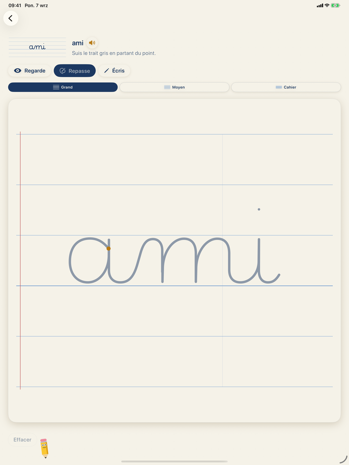 Plumélio sur iPad : le mot ami tracé en écriture cursive sur un lignage Seyès